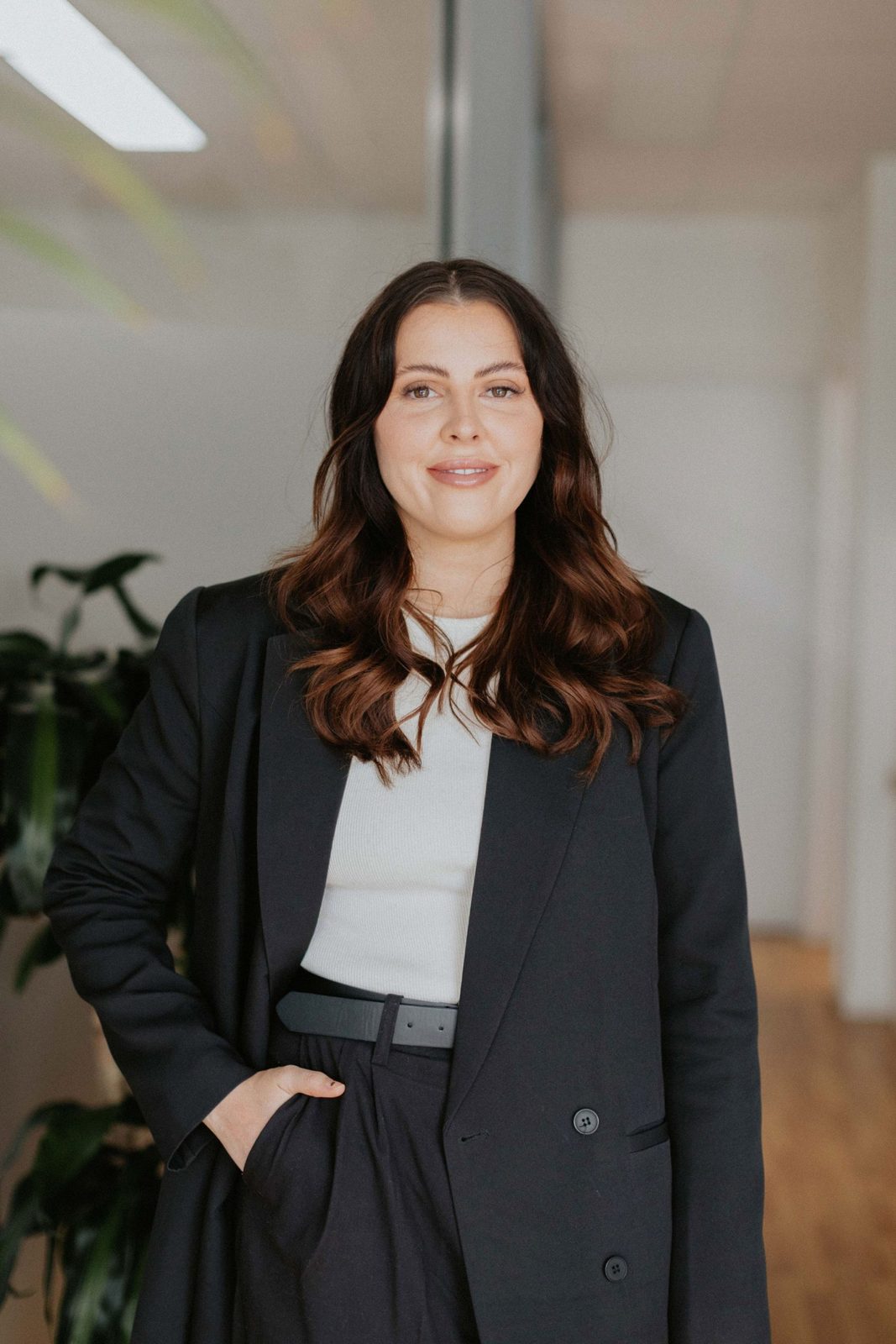 Luiza Struska, Principal Solicitor, standing in the ConnectLaw office